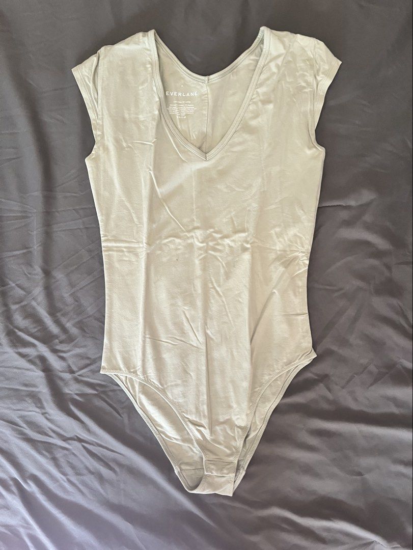 Everlane V-Neck Bodysuit (Category: Others Tops) located in Taguig. Submitted by nrox_ (Listing ID 1445090872, Image 1). Description: Light/mint green v-neck bodysuit from Everlane.