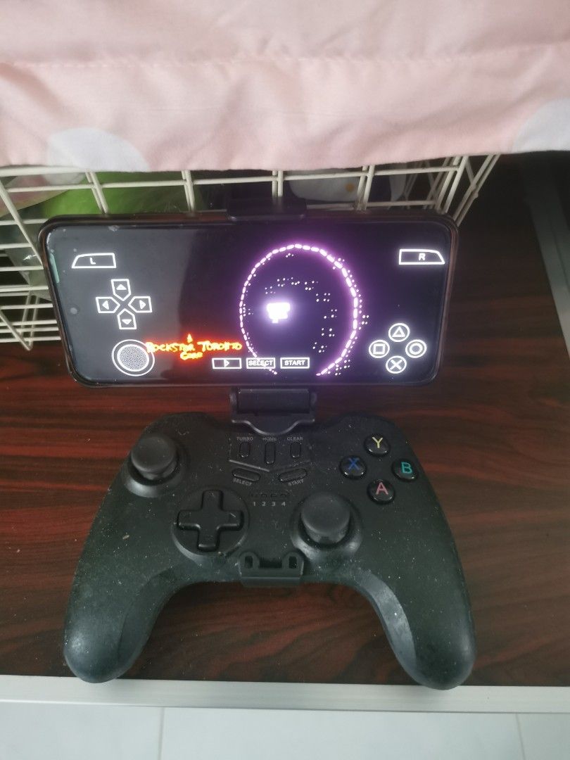 Everything else (Category: Everything Else) located in Singapore. Submitted by avengedan (Listing ID 1302957392, Image 2). Description: - Bluetooth car (Not available) - Phone Stand or Gaming Stand $10 - Android Controller gaming $15.