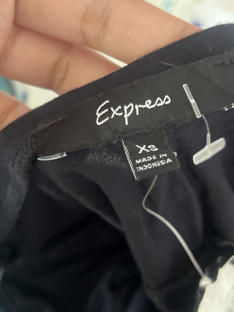 Express Black Strapless Sequin Detail Top XS (Category: Sleeveless) located in Quezon City. Submitted by unaespiritu (Listing ID 1445070371, Image 2). Description: - Brand: Express - Style: Black strapless top - Features: Ruched bust detail, sequin panel across midriff - Straps: Thin spaghetti straps - Origin: Made in Indonesia - Size: XS.