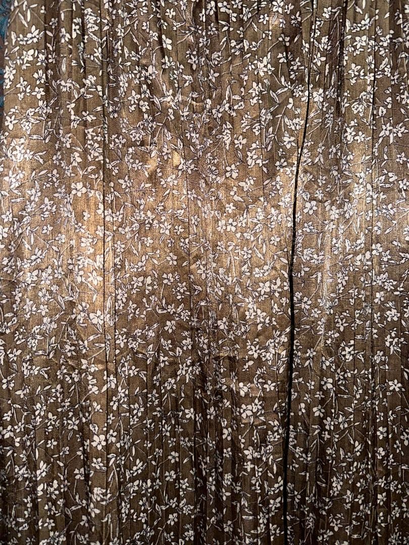 Floral Maxi Slip Dress (Category: Dresses) located in Manila. Submitted by naojinji (Listing ID 1445162288, Image 3). Description: 🤍 Flowy brown maxi dress with a dainty white floral print ☁️ Free size (for real, can fit all types of body types!) 🤍 Thrifted/pre-loved – worn only a few times, still looks brand new ☁️ No major flaws, stains, or tears 🤍 Adjustable thin straps with a relaxed, breezy fit – perfect for summer days or layering!.