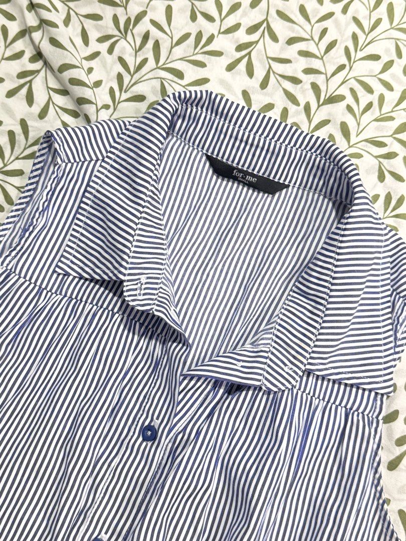 forme blue striped sleeveless button down collared shirt peplum top (Category: Sleeveless) located in Bacoor. Submitted by ukhayz (Listing ID 1445187660, Image 2). Description: for me blue striped blouse sleeveless collared shirt casual wear size s on tag — garterized waist, can fit until semi-large seller’s fav! will not sell for lower unless buying multiple items:) tags: brandy melville sleeveless uniqlo button down cotton blend 2000s vintage p