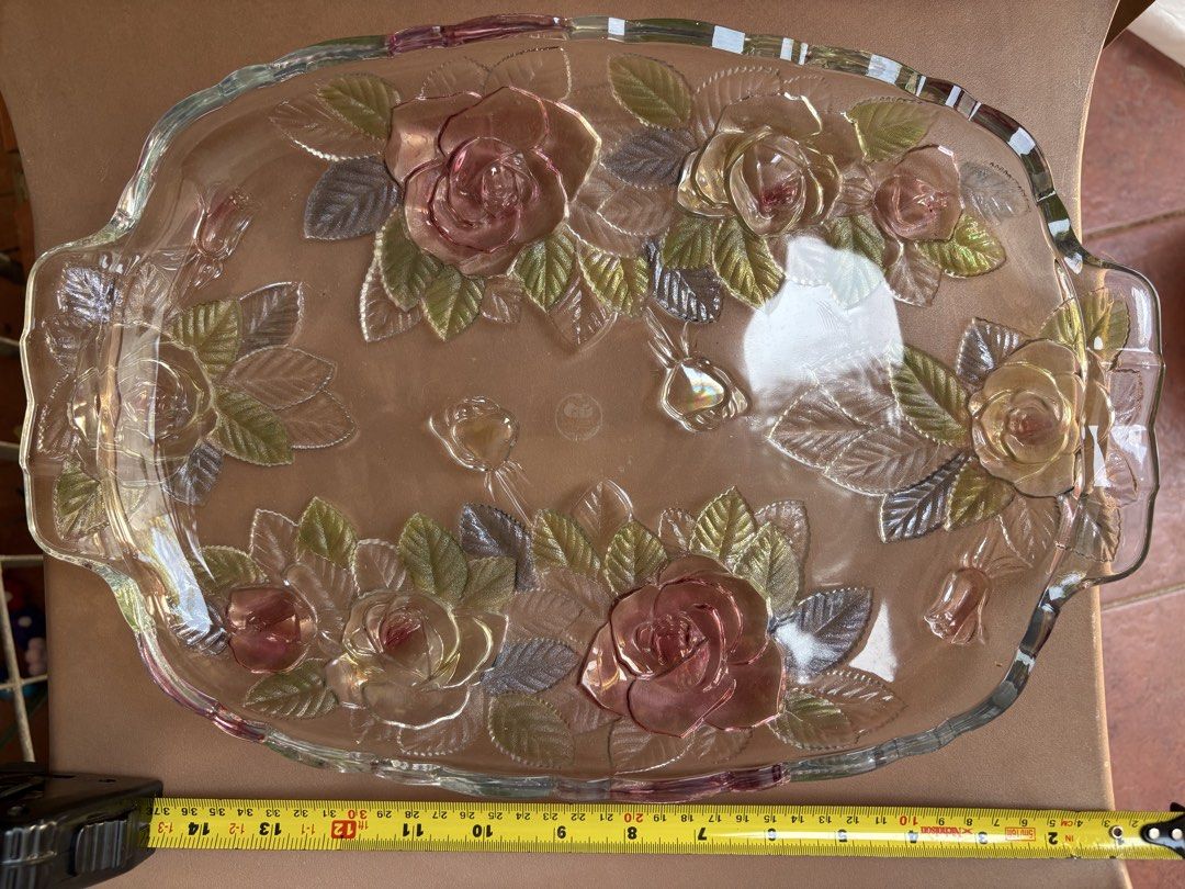 Still available: Calla Lily Design. Rose tray SOLD (Category: Dinnerware & Cutlery) located in Las Pinas. Submitted by rubysloth3691 (Listing ID 1445159592, Image 2). Description: - 500 pesos each - Beautiful glass serving tray - Available in rose or calla lily design - Clear glass with colored accents - Approx. 14 inches long - Ideal for serving snacks or as a decorative piece - Perfect for parties or everyday use.