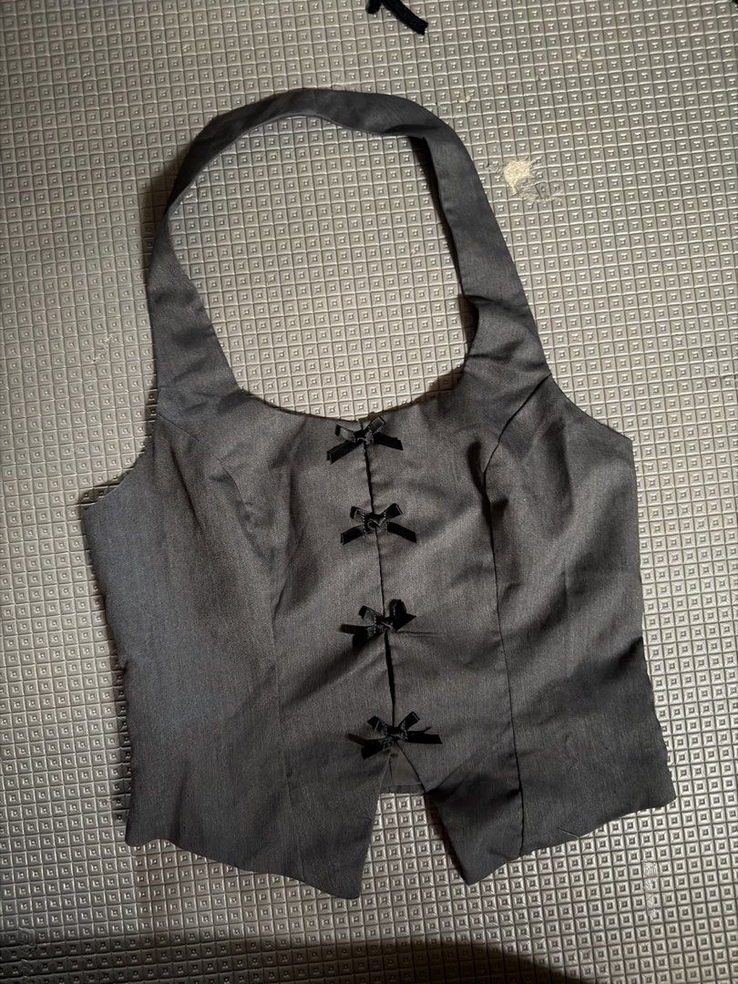 Grey Halter Neck Vest Top with Bows (Category: Sleeveless) located in Caloocan City. Submitted by andraaa_ (Listing ID 1445179414, Image 1). Description: - Grey halter neck vest top -best fit xs-slightly med -pm for we .