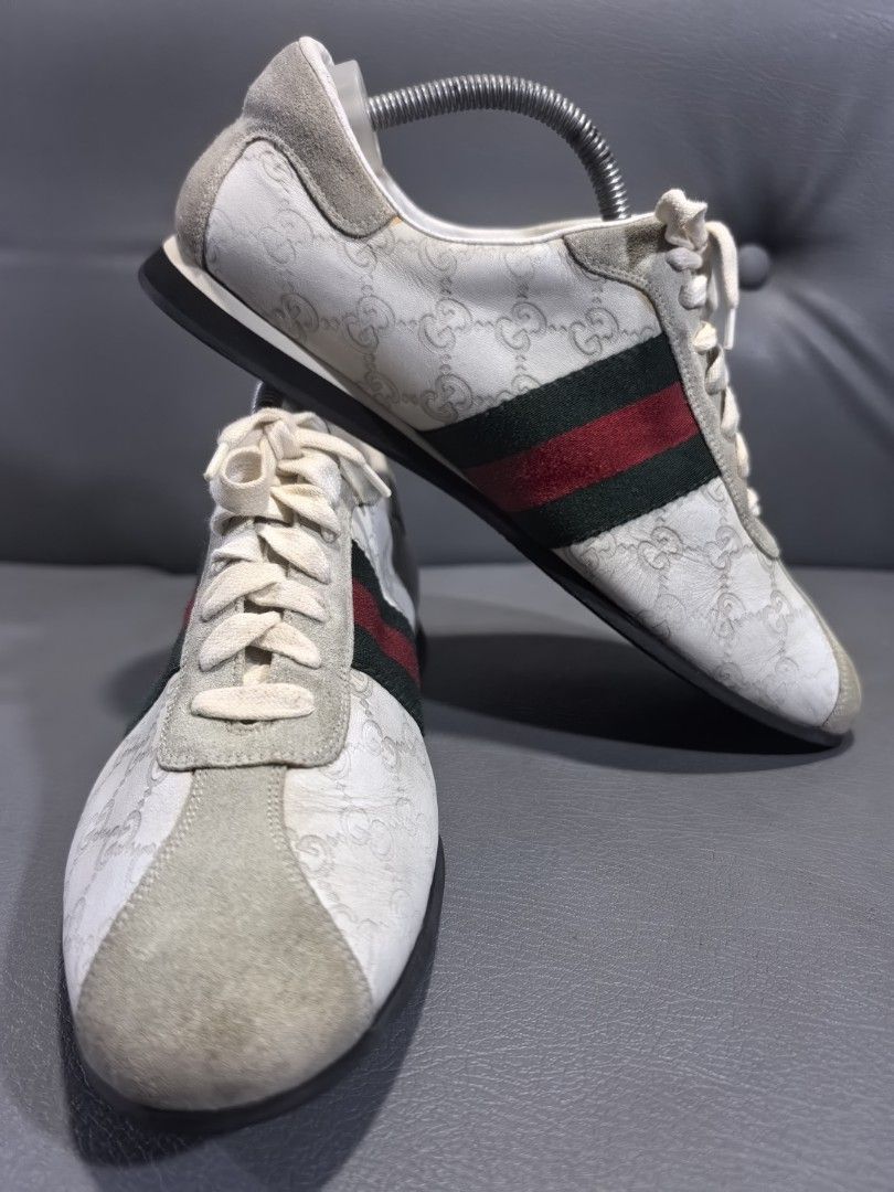 Gucci GG Canvas Sneakers Size 42 (Category: Sneakers) located in Cagayan de Oro. Submitted by pootx (Listing ID 1445182469, Image 1). Description: - Authentic Gucci sneakers in classic GG canvas - Iconic green and red stripe detail - Made in Italy - Size: 42 - Condition: Shows some signs of wear on the toe cap and insoles, with dirt on the soles. Overall still in good shape..