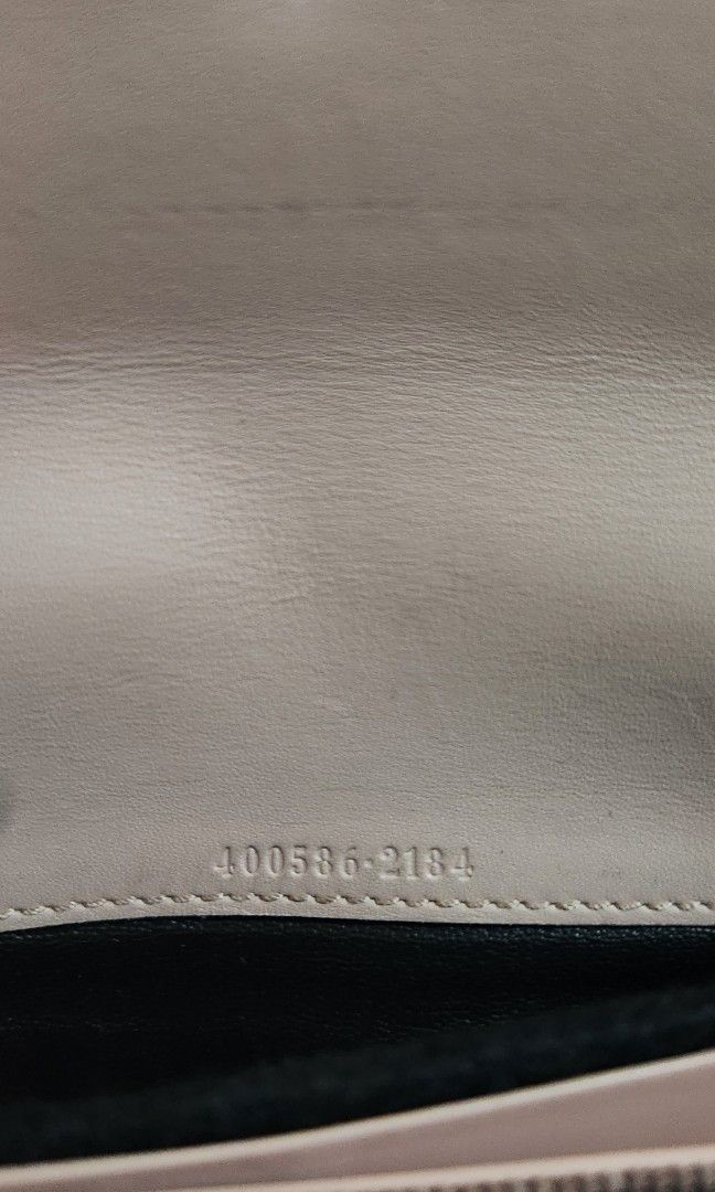 Gucci GG Marmont Python Chain Wallet (guaranteed) (Category: Luxury Bags & Wallets) located in Caloocan City. Submitted by wearandcarry (Listing ID 1403335960, Image 3). Description: - Gucci GG Marmont chain wallet - Snakeskin exterior - Pearl-embellished GG logo - Chain strap - Flap closure - Brown and beige color palette - Rectangular shape - Textured finish.