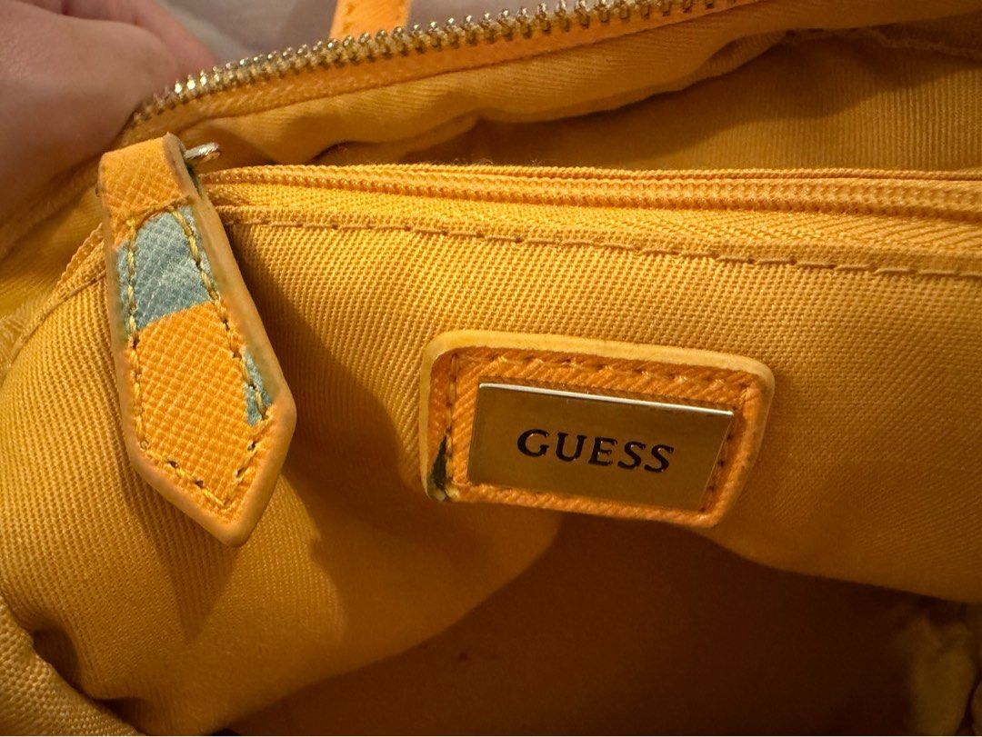 Guess Yellow Floral Mini Backpack (Category: Backpacks) located in Cavite. Submitted by cloudbar99 (Listing ID 1445063943, Image 2). Description: Read for details! (^0^)/ ~* - Cute yellow Guess mini backpack - Bold red floral print - Front zip pocket - Adjustable straps - Interior Guess logo tag - Minor scuffs on zipper pull and strap attachment - Ideal for carrying essentials Reasons for selling: declutterring my closet! 🥹 Payment: GCASH Delive