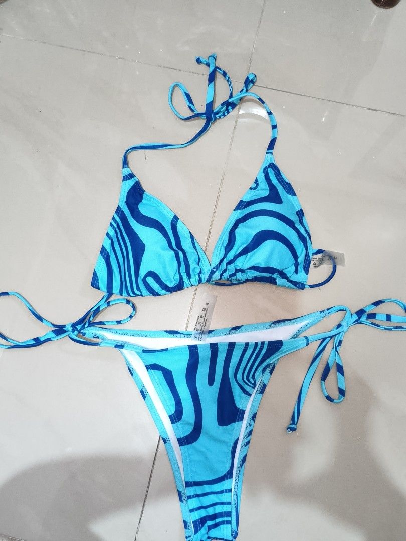 halter triangle top and side-tie bottoms (Category: Bikinis & Swimsuits) located in Tuguegarao City. Submitted by decluttwith_hs (Listing ID 1445076478, Image 3). Description: keri s-m.
