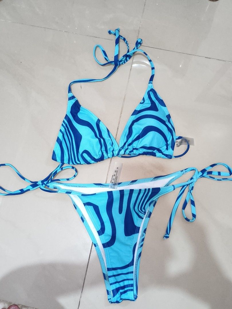 halter triangle top and side-tie bottoms (Category: Bikinis & Swimsuits) located in Tuguegarao City. Submitted by decluttwith_hs (Listing ID 1445076478, Image 1). Description: keri s-m.