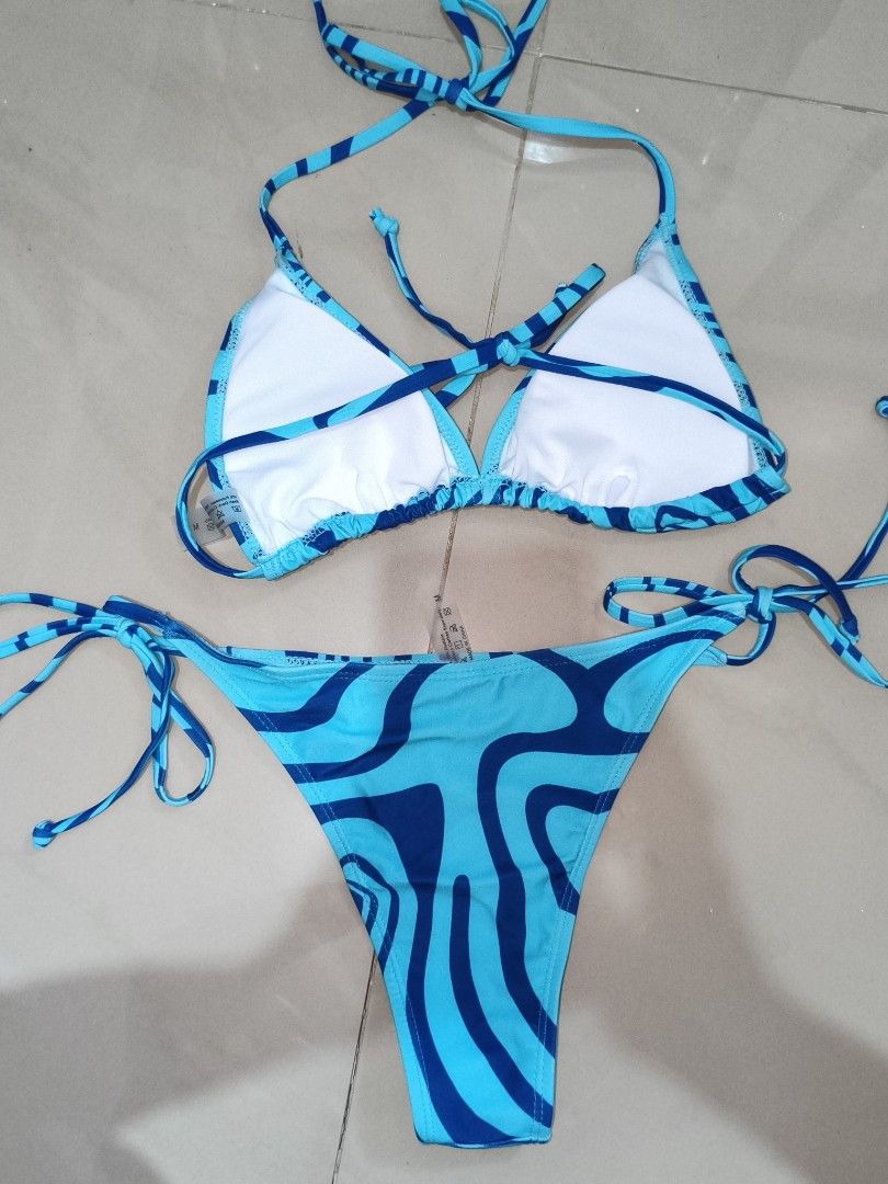 halter triangle top and side-tie bottoms (Category: Bikinis & Swimsuits) located in Tuguegarao City. Submitted by decluttwith_hs (Listing ID 1445076478, Image 2). Description: keri s-m.