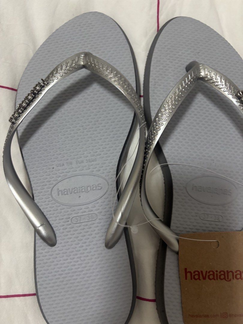 Havaianas Slim Point Steel Gray Flip Flops (Category: Slippers and slides) located in Pasig City. Submitted by smgss (Listing ID 1445089271, Image 2). Description: - Brand: Havaianas - Color: Steel Gray - Feature: Sparkly straps - Size: 37-38 EUR / 7-8 USA - Condition: Brand new, with tag - Ideal for: Casual wear, beach trips.