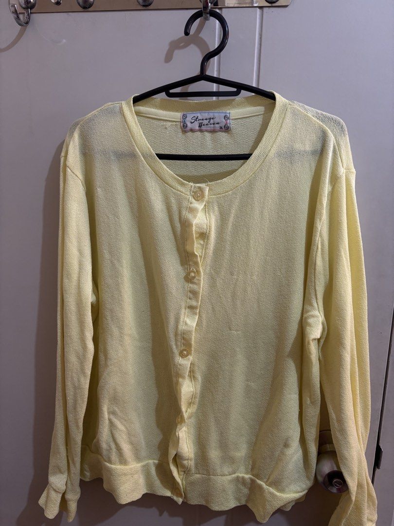 Heaven Yellow Button-Up Cardigan (Category: Coats, Jackets and Outerwear) located in Manila. Submitted by declutterrinmanila (Listing ID 1445142840, Image 1). Description: - Brand: Shazye Heaven - Color: Light Yellow - Style: Button-up Cardigan - Neckline: Crew Neck - Sleeves: Long Sleeves - Material: Lightweight, slightly textured - Features: Classic, simple design, ideal for layering 🩷 Price negotiable Sf should be shouldered by buyer.