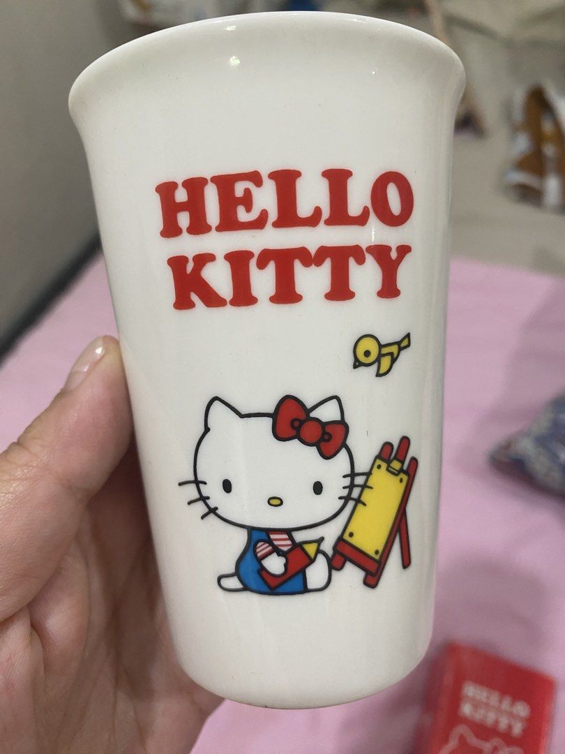 Hello Kitty Ceramic Cup with Box (Category: Coffee & Tea Tableware) located in Caloocan City. Submitted by anonimitya06091 (Listing ID 1445177014, Image 2). Description: - Adorable Kitty cup featuring Kitty painting. - Includes original red box. - Ideal for Kitty collectors and fans. - A must-have addition to your collection!.