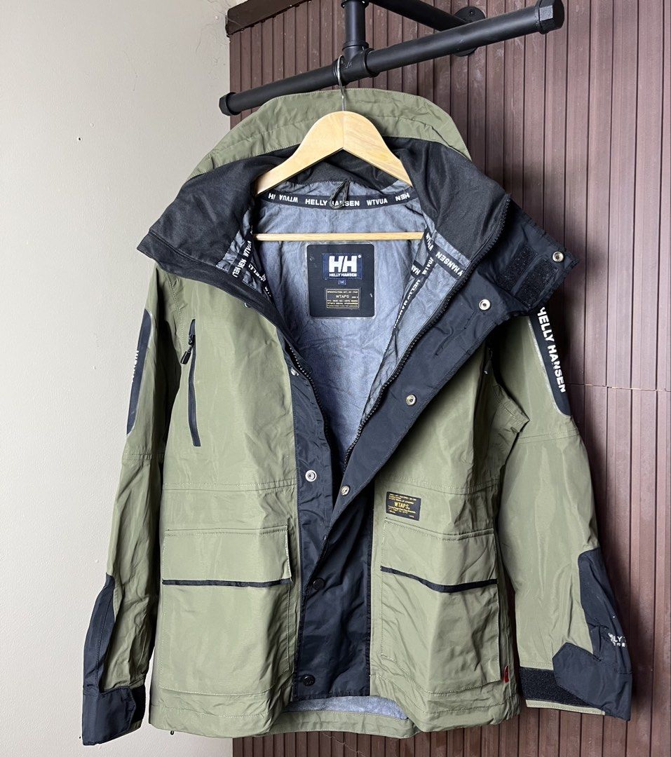 Helly Hansen - WTAPS Sherpa Hooded Jacket (Category: Coats, Jackets and Outerwear) located in Cabanatuan. Submitted by cabsygoods (Listing ID 1445169940, Image 2). Description: Helly Hansen - WTAPS Sherpa Hooded Jacket Dimes 23 x 27 inches Very good condition Issue minimal crack prints Color rate 9/10 Dm to purchase! 📩.