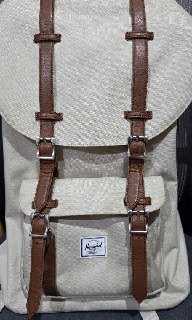 Herschel Little America (Category: Backpacks) located in Quezon City. Submitted by pe12sonal_declutter (Listing ID 1445055954, Image 1). Description: Herschel signature backpack. Iconic mountain style, reinvented with modern features built to carry everything you need for a full day. Features: Padded and fleece lined floating sleeve fits a 15"/16" laptop Laptop sleeve dimensions: 12.5" (H) x 11.25" (W) Easy U-pull drawcord closure Carry comfortab
