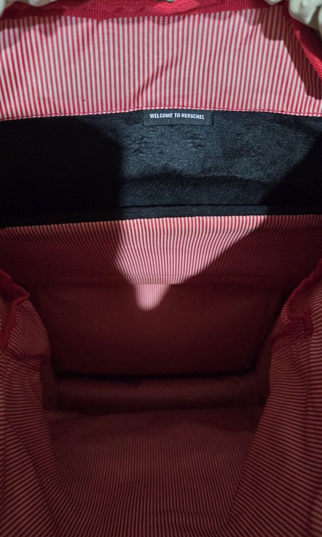 Herschel Little America (Category: Backpacks) located in Quezon City. Submitted by pe12sonal_declutter (Listing ID 1445055954, Image 3). Description: Herschel signature backpack. Iconic mountain style, reinvented with modern features built to carry everything you need for a full day. Features: Padded and fleece lined floating sleeve fits a 15"/16" laptop Laptop sleeve dimensions: 12.5" (H) x 11.25" (W) Easy U-pull drawcord closure Carry comfortab