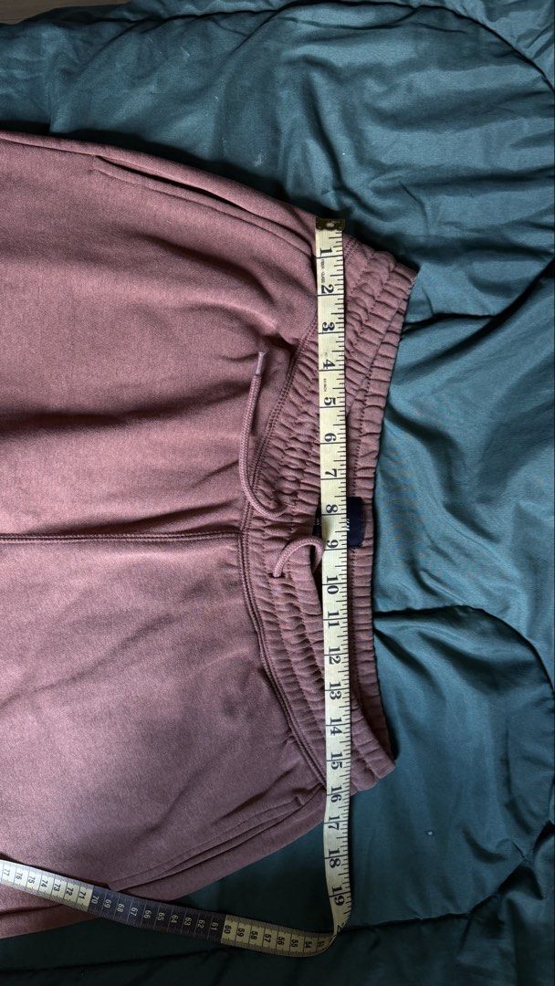 H&M Relaxed Fit Sweatpants - Size S (Category: Joggers) located in Caloocan City. Submitted by _preloved_bb (Listing ID 1445103266, Image 2). Description: - Brand: H&M - Color: Brownish-pink - Fit: Relaxed - Style: Jogger sweatpants - Size: S - Features: Elastic waistband with drawstring, two side pockets, cuffed ankles - Material: Made in Bangladesh - Measurements: Length approx. 39 inches, Waist approx. 13 inches (unstretched).