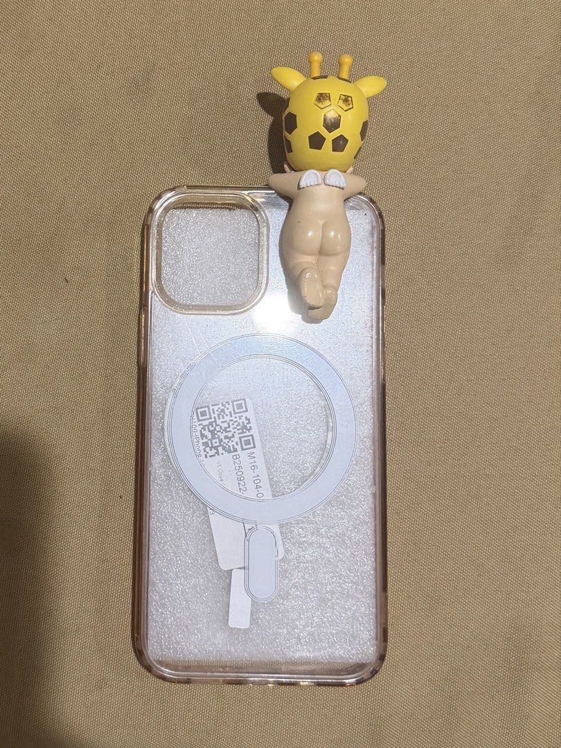 Ip12 Phone Case with Sonny Angel Hipper (Category: Cases & Sleeves) located in Manila. Submitted by rhaena (Listing ID 1445160793, Image 1). Description: Clear magsafe iphone 12 phone case with yellowing already, bought at orange app for PHP 79. On it is a giraffe sonny angel hipper! You may DIY and transfer the hipper to cases you own :).