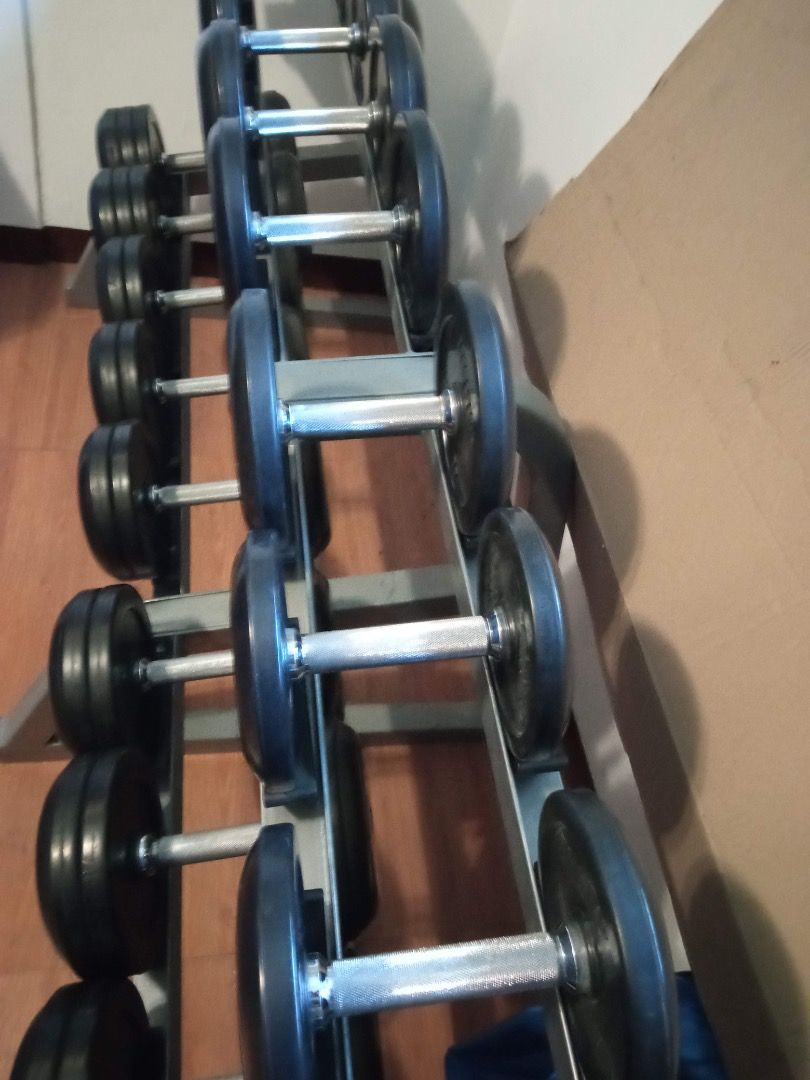 Ivanko Dumbbell Set with Rack (Category: Weights & Dumbbells) located in Manila. Submitted by el_valor (Listing ID 1445185950, Image 3). Description: - Ivanko Complete dumbbell set: 5 lbs to 50 lbs (5 lb increments) - Two-tier rack included for organized storage - Rubber coated heads and handles for a comfortable and secure grip - Ideal for building your home gym - Just in storage .