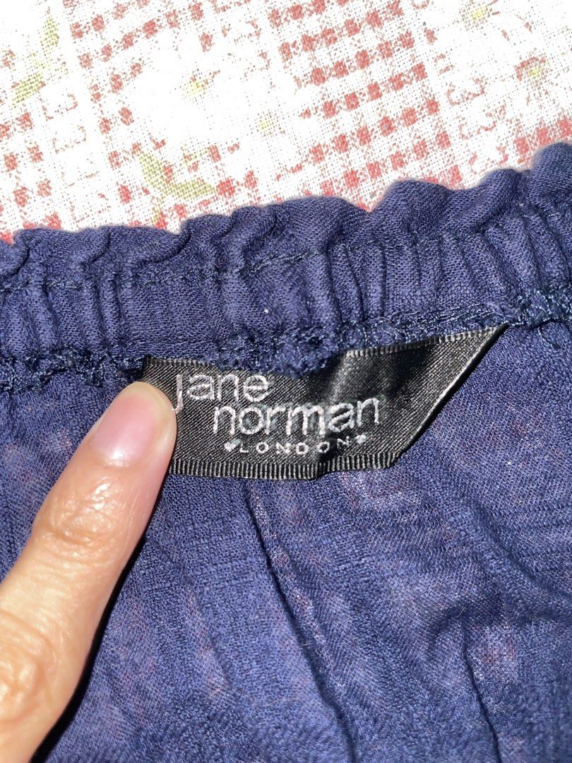 Jane Norman Off-Shoulder Smocked Peasant Top (Category: Others Tops) located in Manila. Submitted by rienissances (Listing ID 1445219826, Image 2). Description: 🎀☁️ jane norman navy off-shoulder top soft, feminine, and effortlessly flattering ♡ smocked waist with the prettiest silhouette. giving vintage y2k, boho princess, and soft coquette energy all at once ✨ 📍 bulacan | manila 💸 gcash | maribank 📦 j&t | lbc | lalamove rules & regulations —