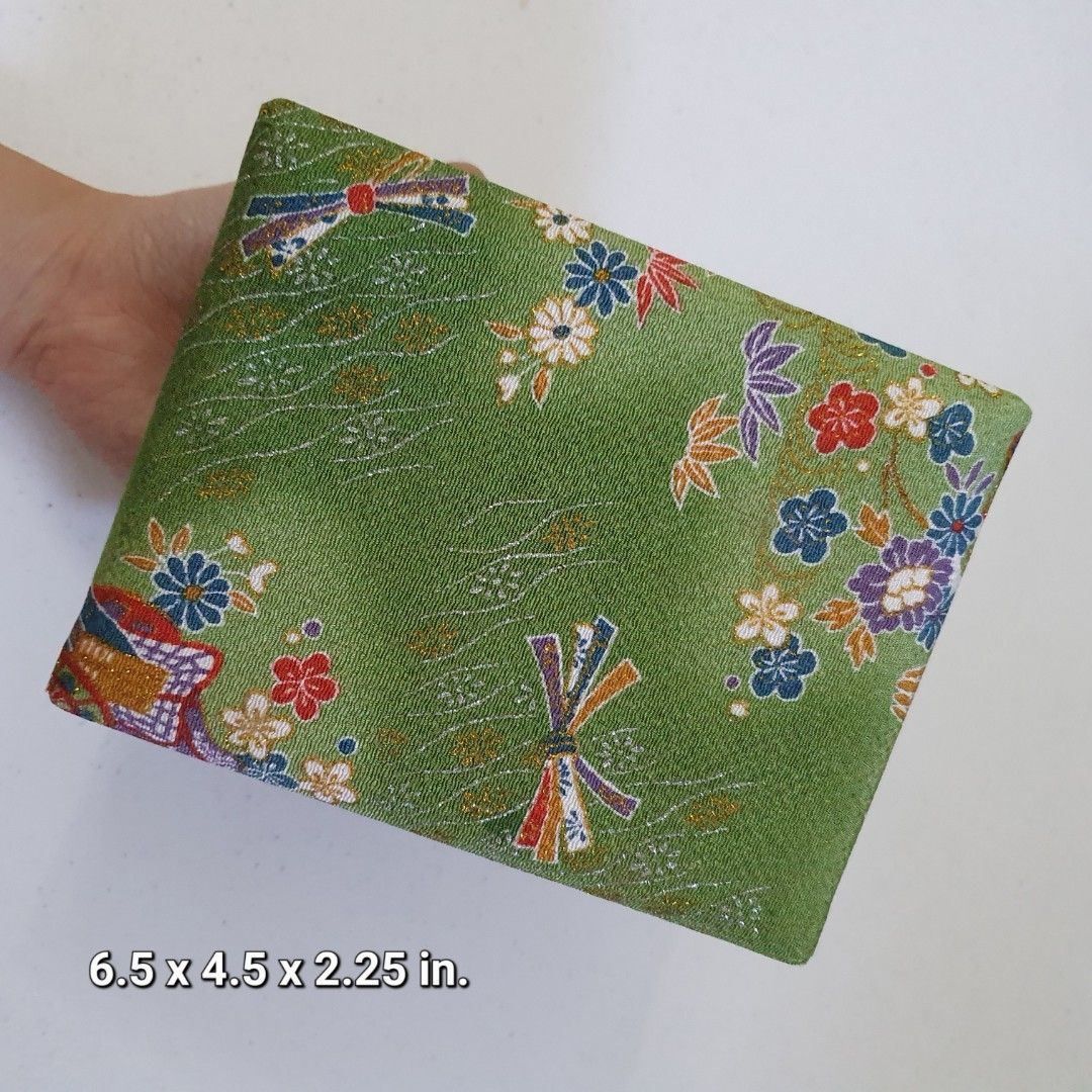 Japanese Style Fabric Storage Box with Floral Pattern (Category: Storage Boxes & Baskets) located in Paranaque City. Submitted by cobien (Listing ID 1445214130, Image 1). Description: - Beautiful Japanese floral fabric box - Vibrant red interior - Dimensions: 6.5 x 4.5 x 2.25 inches - Ideal for storing small items or as a decorative accent - Comes with a small tag inside.