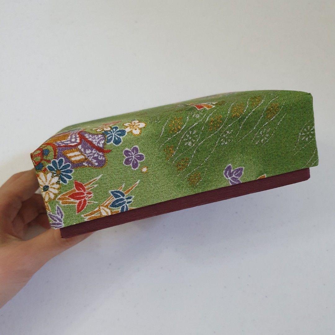 Japanese Style Fabric Storage Box with Floral Pattern (Category: Storage Boxes & Baskets) located in Paranaque City. Submitted by cobien (Listing ID 1445214130, Image 3). Description: - Beautiful Japanese floral fabric box - Vibrant red interior - Dimensions: 6.5 x 4.5 x 2.25 inches - Ideal for storing small items or as a decorative accent - Comes with a small tag inside.