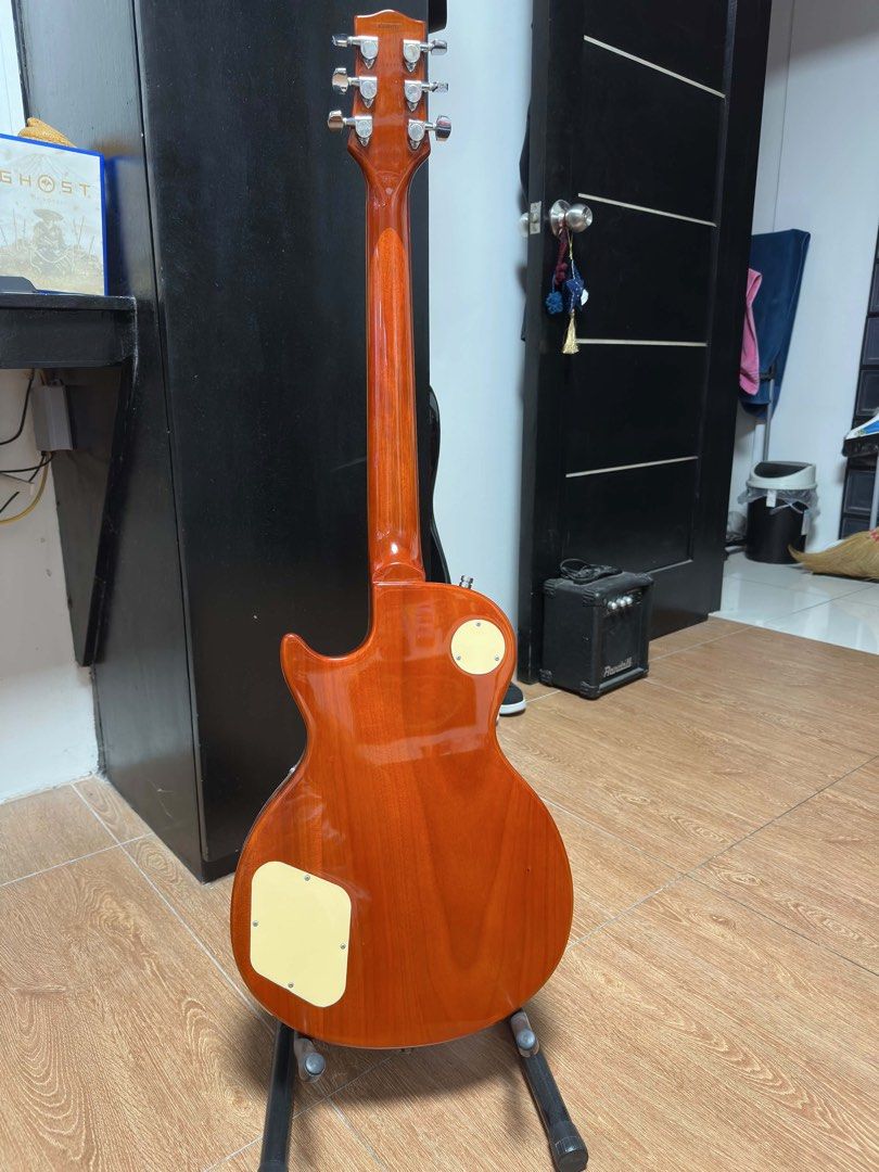 JAY TURSER LES PAUL (Category: Musical Instruments) located in Manila. Submitted by parvis_wayne (Listing ID 1445183437, Image 3). Description: Jay Turser Les Paul Fixed Price: 14k FULL SET UP Strings: Elixir Electric Guitar Nanoweb Gauge 9 Upgraded parts to: Guyker Roll-on saddle Guyker V Shaped Tail Piece Strap Lock buttons included! Taguig Area Can do meet up within Taguig.