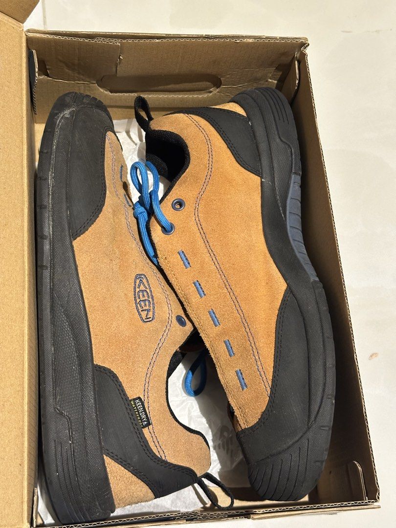 KEEN Suede Waterproof Outdoor Shoes (Category: Sneakers) located in Singapore. Submitted by windcheung (Listing ID 1445196909, Image 1). Description: - KEEN shoes - Tan suede material - Blue laces - Waterproof - Ideal for outdoor activities - Excellent sole grip - Plenty of life remaining size 43.
