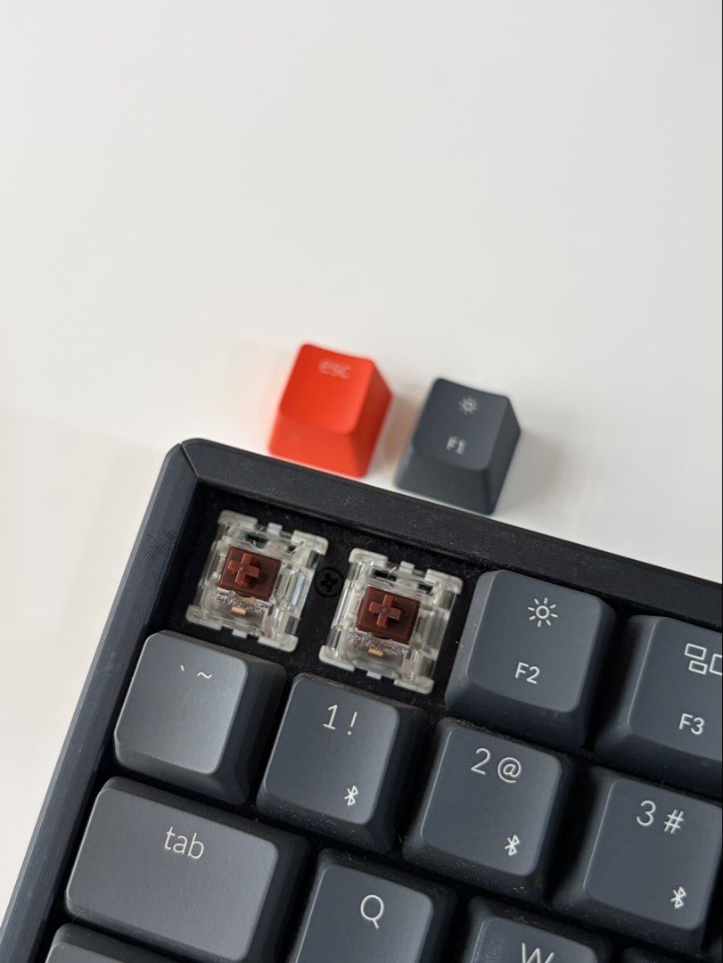 Keychron K2 Version 2 Keyboard (Category: Computer Keyboard) located in Makati City. Submitted by benigls (Listing ID 1445180839, Image 3). Description: - Keychron K2 V2 with Wooden Wrist Rest - Issue: I miss placed the original USB cord, but I’ll provide a generic USB C to C cord - Brown Keys - No original box included .
