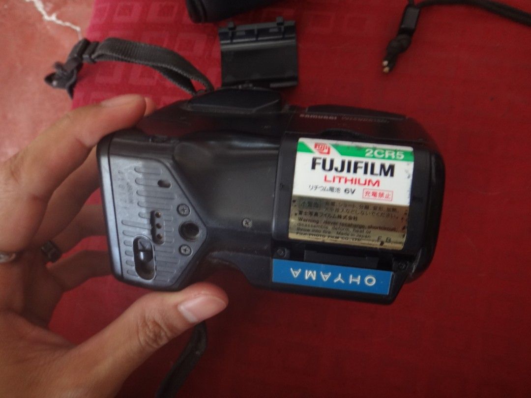 Kyocera Samurai X3.0 35mm Film Camera with Flash (Untested) (Category: Cameras) located in Silang. Submitted by carlodelva46951 (Listing ID 1445071615, Image 2). Description: - Kyocera Samurai X3.0 35mm film camera - Built-in flash - Uses Fujifilm 2CR5 lithium batteries - Strap is attached - Film compartment is open in photos Note: - Has a battery but not working - Have not tried it yet, coz of no battery.