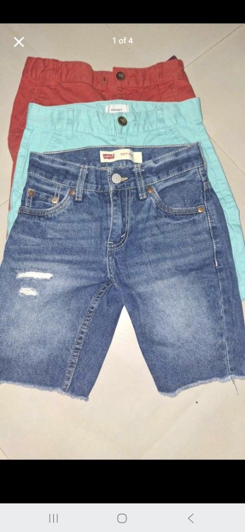 Levi's Denim Shorts & 2 old navy (Category: Babies & Kids Fashion) located in Cavite. Submitted by 92939494959597 (Listing ID 1445053442, Image 1). Description: - Bundle of 3 boys' shorts - Includes: 1 pair distressed Levi's denim shorts (raw hem), 1 teal chino shorts, 1 red chino shorts - Ideal for summer wear.