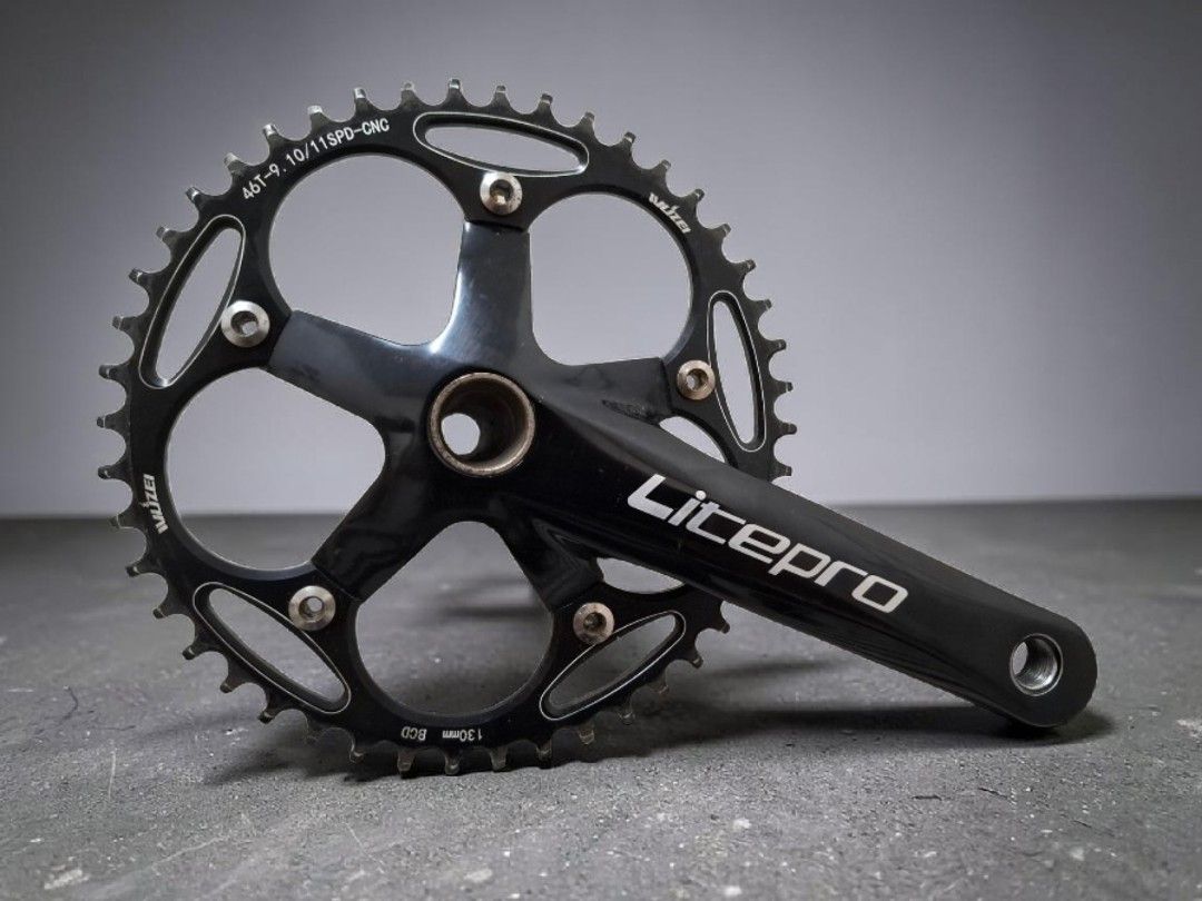 Litepro Folding Bike Crankset (Category: Bicycles) located in Manila. Submitted by MYK.BikeAndSell (Listing ID 1445234005, Image 2). Description: [ Please read carefully before making an inquiry. ] Litepro Folding Bike Crankset > 130BCD > 170mm crank-arm length > 53T chainring > Wuzei 46T Narrow Wide Road Chainring > BSA Bottom Bracket 68/73 - Seldom used - Good working condition - First owner Honest issues: Signs of usage Loc: Sampaloc, Manila -
