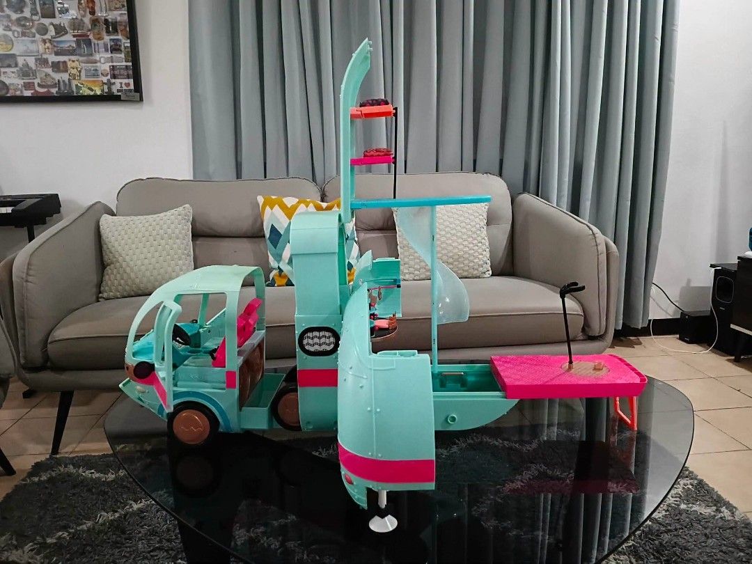 LOL Surprise! Glam Camper Van Playset (Category: Kids Toys) located in Manila. Submitted by dampotmnl (Listing ID 1445216207, Image 3). Description: - LOL Surprise Glam Camper Van playset - Opens to reveal multiple play areas - Features a slide, bunk beds, and a pool - Lights and sounds are functional - Note: Some accessories might be missing.