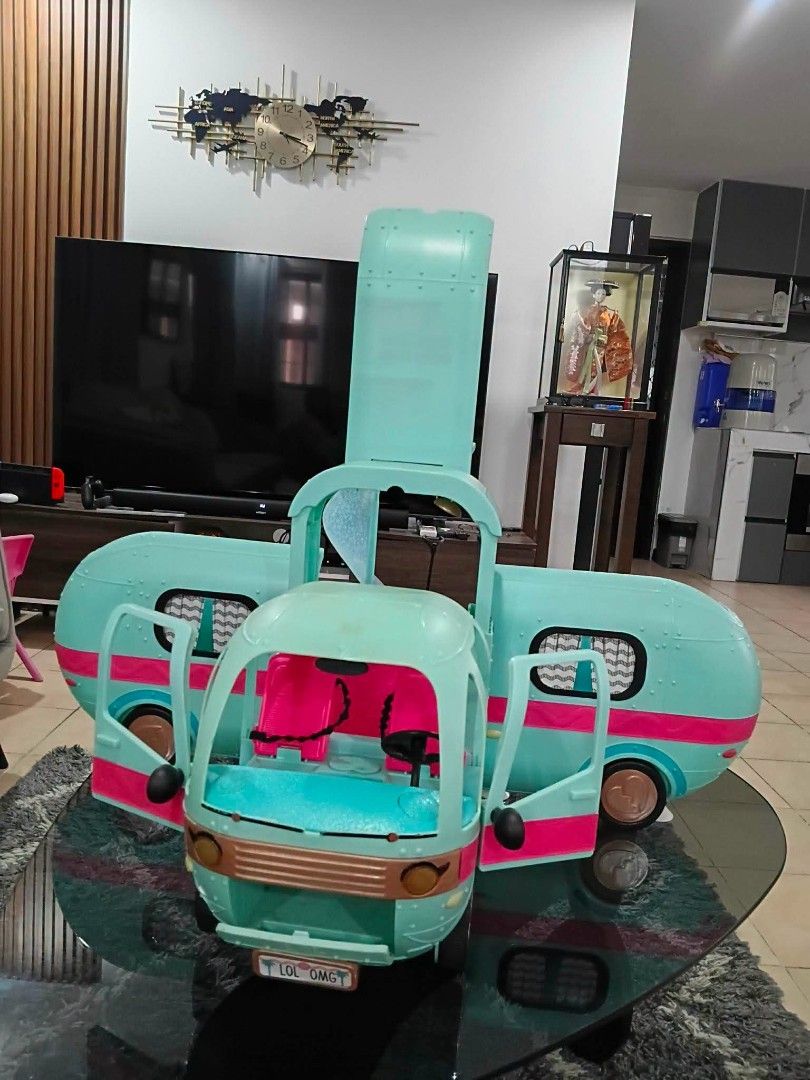LOL Surprise! Glam Camper Van Playset (Category: Kids Toys) located in Manila. Submitted by dampotmnl (Listing ID 1445216207, Image 2). Description: - LOL Surprise Glam Camper Van playset - Opens to reveal multiple play areas - Features a slide, bunk beds, and a pool - Lights and sounds are functional - Note: Some accessories might be missing.