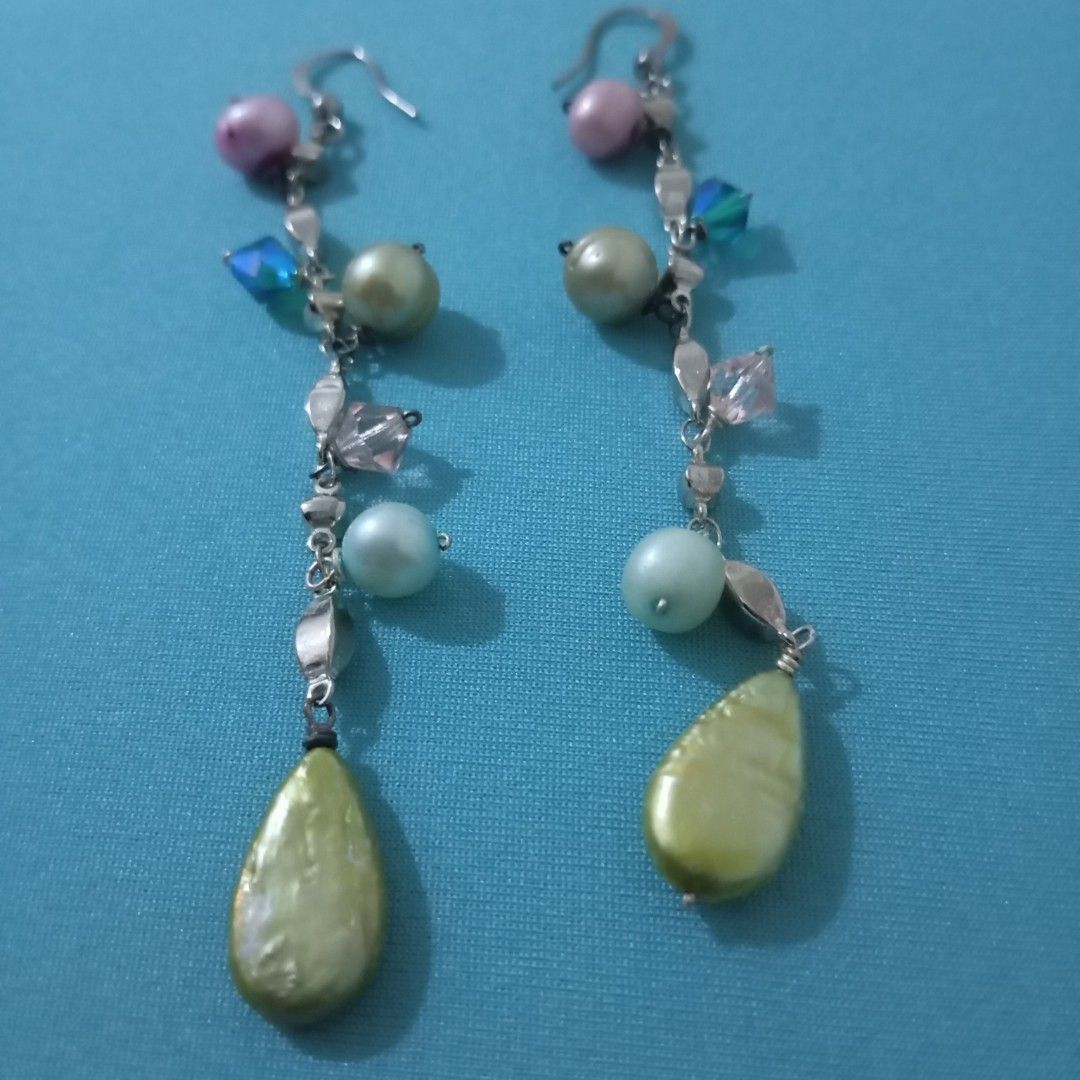 Long Dangle Earrings with Pearls and Crystals (Category: Earrings) located in Mandaluyong City. Submitted by ilightcoproducts (Listing ID 1445116804, Image 1). Description: - Cute long dangle earrings - Features pastel colored beads and teardrop pearls - Silver-tone metal hooks - Adds a pop of color to any outfit - Lightweight and comfortable to wear.
