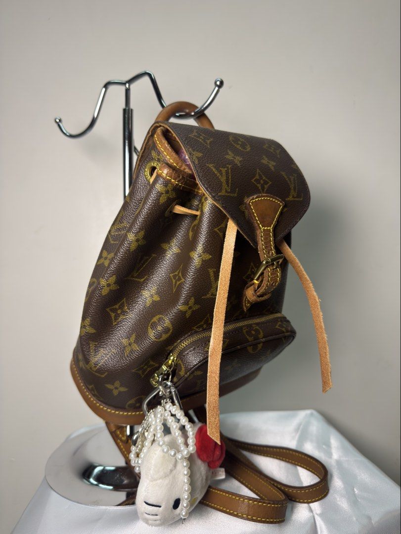 Louis Vuitton Montsouris mini backpack (Category: Luxury Bags & Wallets) located in Quezon City. Submitted by vintage_finds14 (Listing ID 1445059176, Image 1). Description: - Classic Louis Vuitton Montsouris mini backpack - Monogram canvas with leather trim and straps .