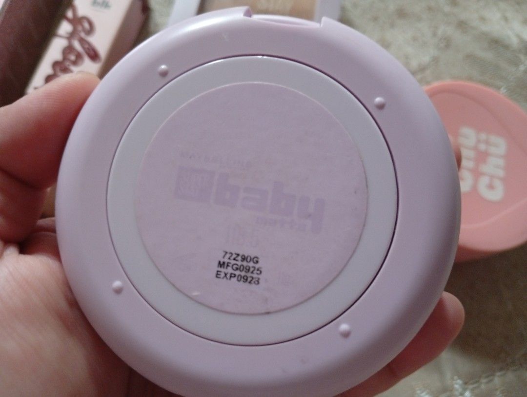 Makeup bundle (Category: Makeup) located in Quezon City. Submitted by janjanrie_2923 (Listing ID 1445234610, Image 3). Description: makeup and skincare bundle glad to glow berry peptide brightening eye cream 70% left chuchu beauty yummy yum skin loose powder in oat 40% left Maybelline superstay powder foundation in 110 used a few times only Maybelline baby skin cushion in shade 118 about 30% left approximately blk glossdrip in sangria shade swatc