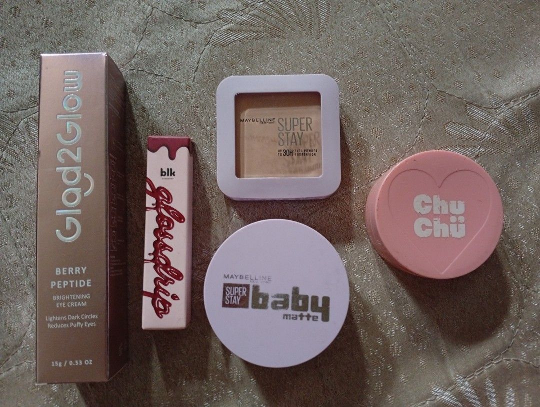 Makeup bundle (Category: Makeup) located in Quezon City. Submitted by janjanrie_2923 (Listing ID 1445234610, Image 1). Description: makeup and skincare bundle glad to glow berry peptide brightening eye cream 70% left chuchu beauty yummy yum skin loose powder in oat 40% left Maybelline superstay powder foundation in 110 used a few times only Maybelline baby skin cushion in shade 118 about 30% left approximately blk glossdrip in sangria shade swatc