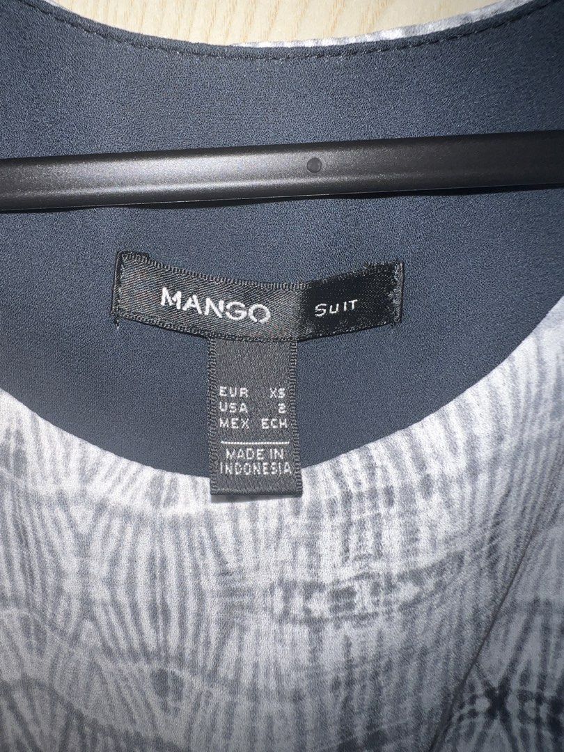 Mango Suit Grey White Patterned Sleeveless Dress (Category: Dresses) located in Makati City. Submitted by datscraper (Listing ID 1445153411, Image 2). Description: - Brand: Mango Suit - Color: Grey and white pattern - RFS: decluttering.