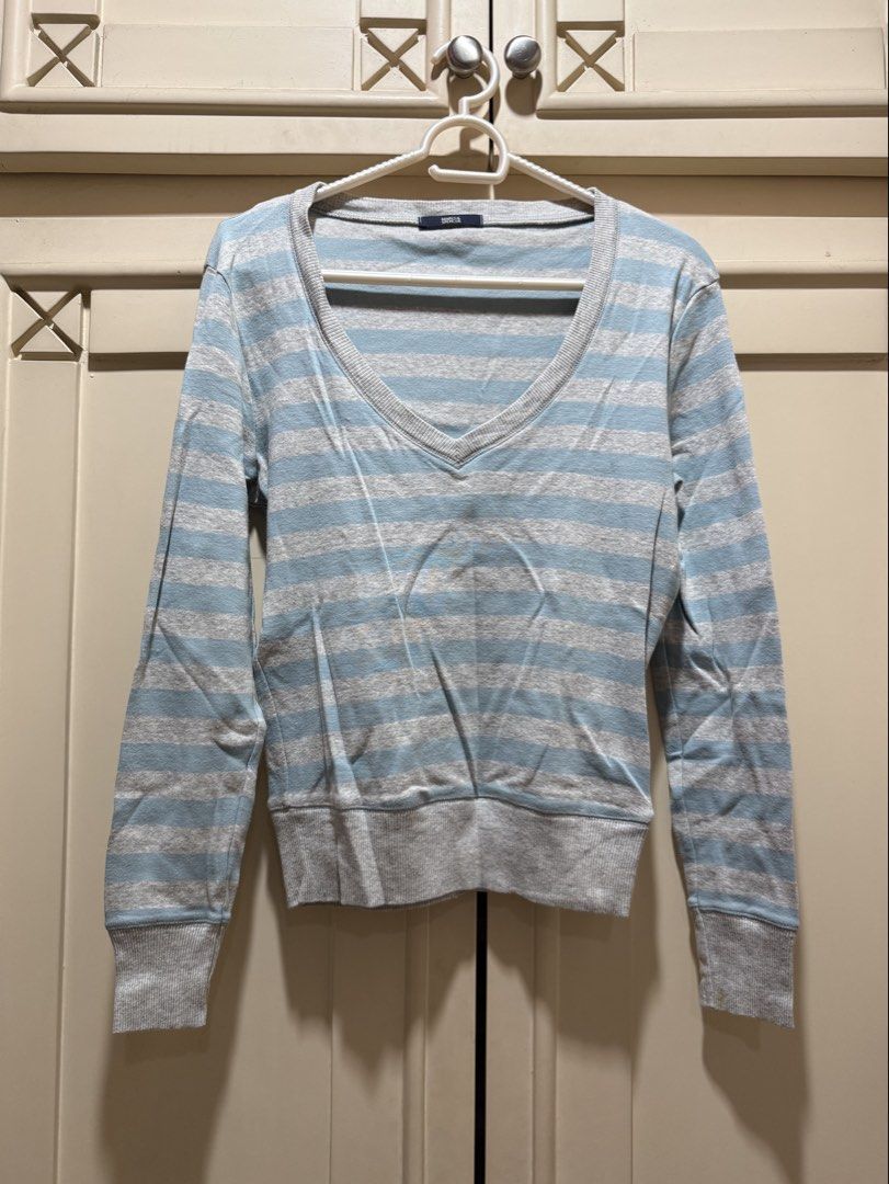 Marks & Spencer Striped Long Sleeve Sweatshirt (Category: Longsleeves) located in Caloocan City. Submitted by oceans18 (Listing ID 1445163887, Image 1). Description: - Light blue and grey striped long sleeve sweatshirt - V-neckline - Ribbed cuffs and hem - Comfortable and casual - Great for everyday wear.