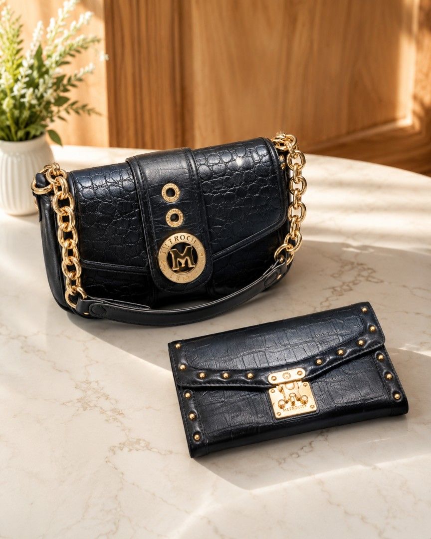 Metrocity metro city bag and wallet bundle (Category: Luxury Bags & Wallets) located in Naguilian. Submitted by jonalyndel00622 (Listing ID 1445115059, Image 1). Description: - Black croc embossed handbag with gold chain strap. - Matching wallet with secure clasp closure. - Both feature elegant gold hardware. - Handbag displays a circular 'M' logo. - Ideal for keeping your essentials organized..