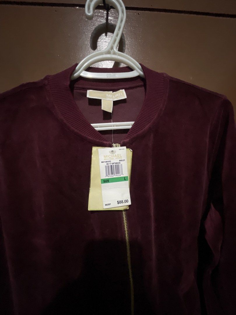 Michael Kors Velour Bomber Jacket Burgundy Size L (Category: Coats, Jackets and Outerwear) located in Manila. Submitted by edensy (Listing ID 1445106579, Image 2). Description: - Brand: Michael Kors - Color: Burgundy - Material: Velour - Style: Bomber Jacket - Size: L - Features: Full zip front, pockets, ribbed collar, cuffs, and hem - Condition: Brand new with original tags attached - Occasion: Great for casual wear.