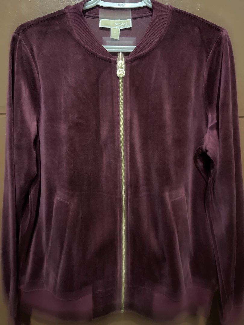 Michael Kors Velour Bomber Jacket Burgundy Size L (Category: Coats, Jackets and Outerwear) located in Manila. Submitted by edensy (Listing ID 1445106579, Image 1). Description: - Brand: Michael Kors - Color: Burgundy - Material: Velour - Style: Bomber Jacket - Size: L - Features: Full zip front, pockets, ribbed collar, cuffs, and hem - Condition: Brand new with original tags attached - Occasion: Great for casual wear.