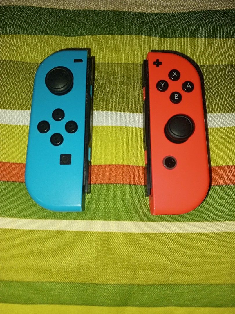 Nintendo Switch Joy-Con Controllers - Blue and Red (Category: Controllers) located in Caloocan City. Submitted by alarconjoh37633 (Listing ID 1445156543, Image 1). Description: - Genuine Nintendo Switch Joy-Con controllers - Includes one Blue Joy-Con and one Red Joy-Con - Standard Left and Right controllers - Ideal for multiplayer gaming sessions - Great as replacement controllers - Tested and confirmed to be in working condition - Issues scratch