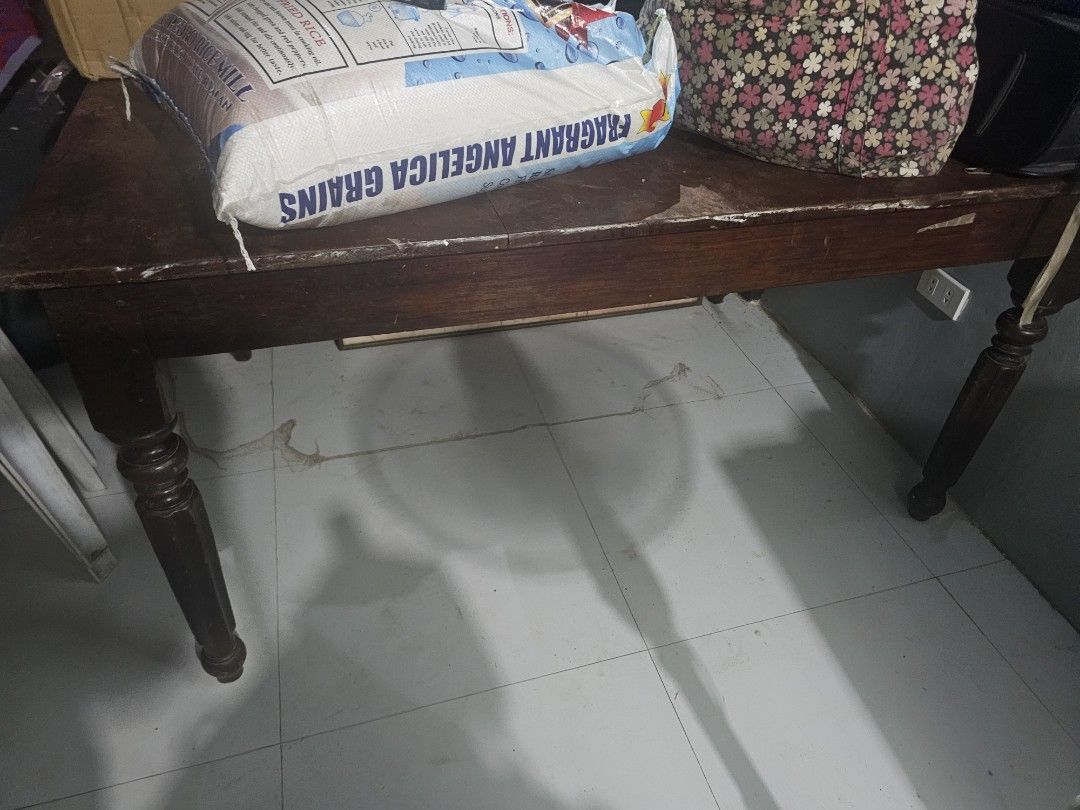 Old all wood dining table (Category: Tables & Sets) located in Manila. Submitted by shoppy15 (Listing ID 1445044151, Image 3). Description: its an old antique table meon mga nakapatong para makita na matibay ginagamit meron mga gasgas na nasa inyo na papano aayusin niyo pero matibay.