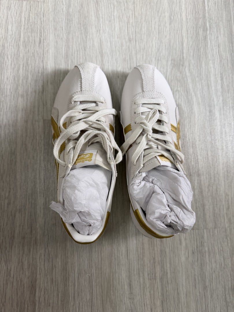 Onitsuka Tiger Mexico 66 Sneakers White Gold (Category: Sneakers) located in Singapore. Submitted by nanana16 (Listing ID 1445105202, Image 2). Description: - Onitsuka Tiger Mexico 66 sneakers - Classic white and gold colorway - Size: UK 4.5 / EU 37.5 - Perfect for casual wear - Super comfy and stylish.