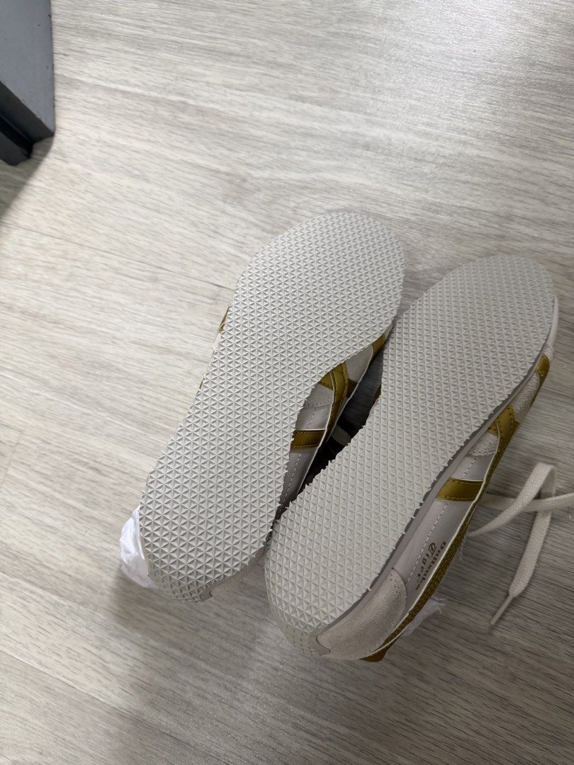 Onitsuka Tiger Mexico 66 Sneakers White Gold (Category: Sneakers) located in Singapore. Submitted by nanana16 (Listing ID 1445105202, Image 1). Description: - Onitsuka Tiger Mexico 66 sneakers - Classic white and gold colorway - Size: UK 4.5 / EU 37.5 - Perfect for casual wear - Super comfy and stylish.
