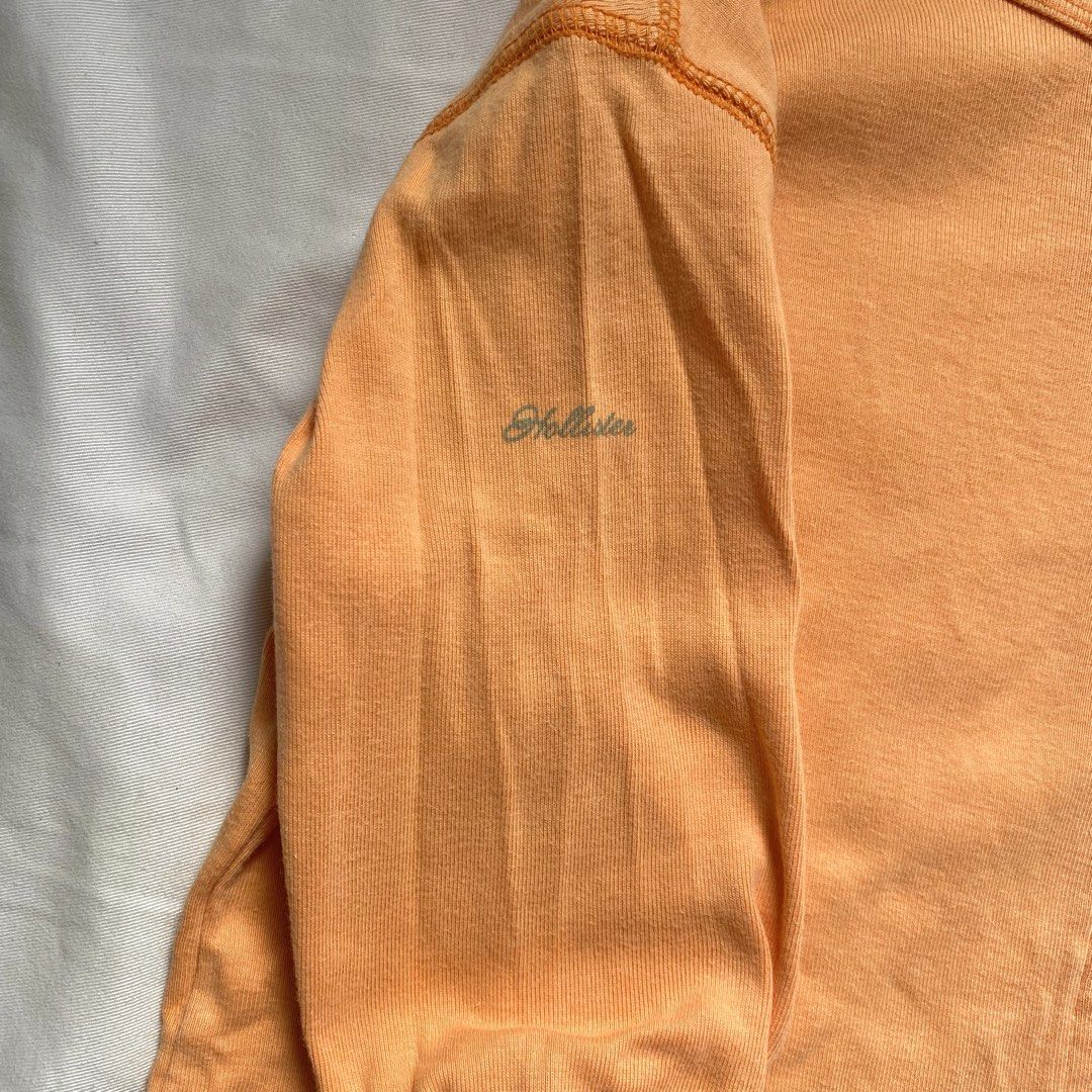 Orange Long Sleeve Zip Up Cardigan (Category: Coats, Jackets and Outerwear) located in Manila. Submitted by _angljpsc (Listing ID 1445179720, Image 3). Description: - Orange long sleeve cardigan - MEDIUM-LARGE SIZE - Zip-up front closure - Soft cotton blend material - Ideal for layering - Subtle stitched detail on hem and cuffs.