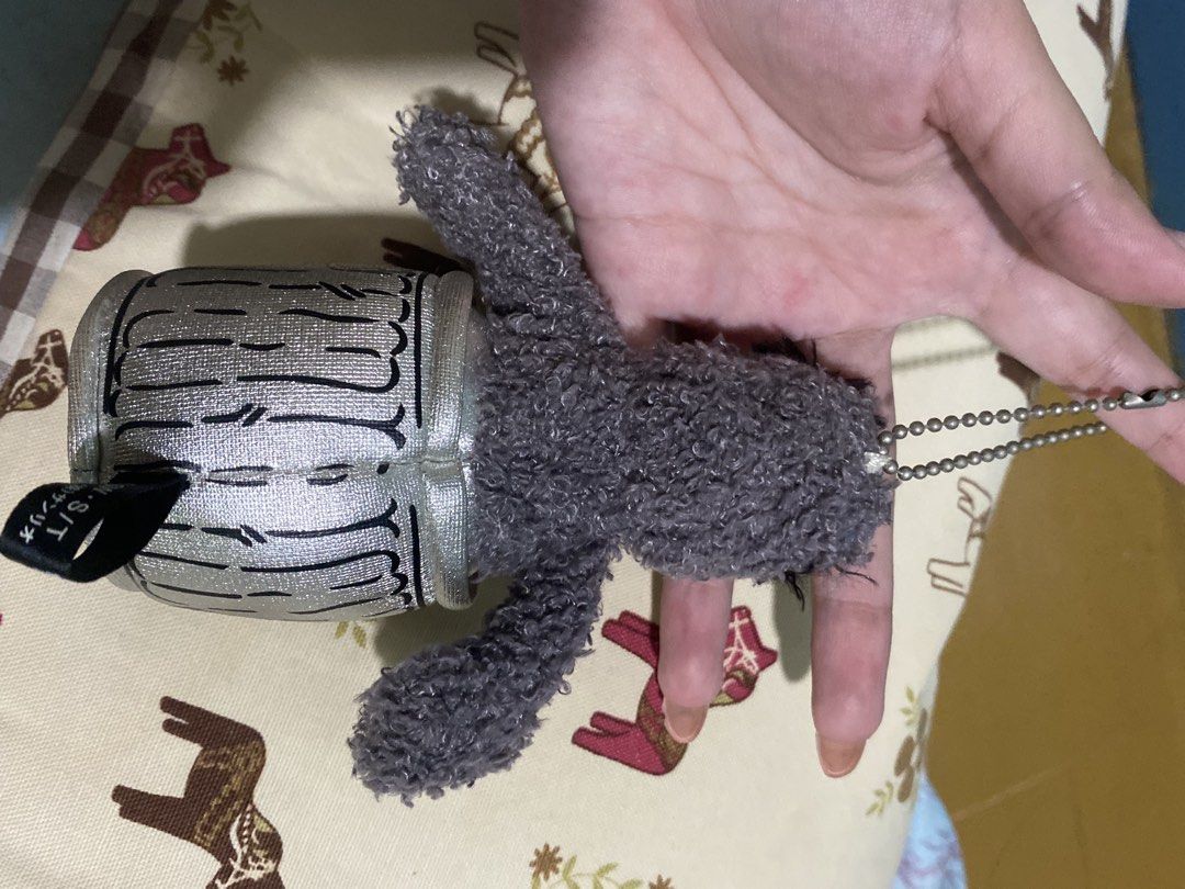 Oscar the Grouch Trash Can Plush Keychain (Category: Plushies & Soft Toys) located in Cagayan de Oro. Submitted by caga67813 (Listing ID 1445164987, Image 2). Description: - Adorable Oscar the Grouch plush keychain. - Features his signature trash can. - Includes a durable metal ball chain. - Ideal accessory for bags, backpacks, or keys. - Manufactured in China..