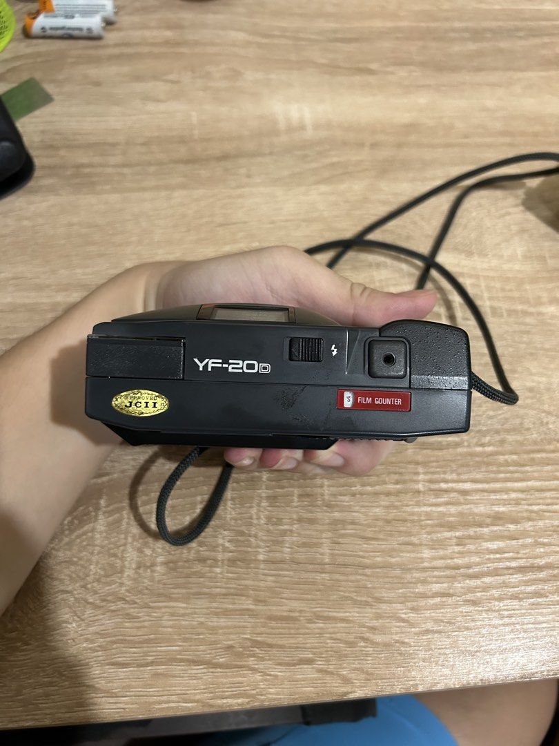 Ricoh YF-20D Quartz Date Film Camera (Category: Cameras) located in Caloocan City. Submitted by lakylee (Listing ID 1445161966, Image 2). Description: - Ricoh YF-20D Quartz Date camera - No sample shots - 35mm lens - Built-in flash - Visible film counter - Adjustable date function (year, month, day) - With JCII Customs sticker (Japan Customs) - Includes attached strap - Fun and easy point-and-shoot.