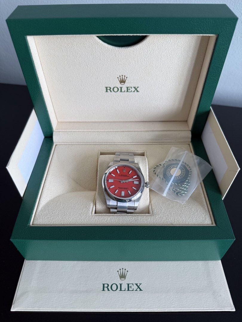 Rolex Coral Red 41mm (Category: Watches) located in Singapore. Submitted by natto26 (Listing ID 1445071727, Image 1). Description: Rolex 124300 Coral Red 41mm, full set unworn Discontinued model Dated late 2020 ** low baller will be politely ignored. Thanks .